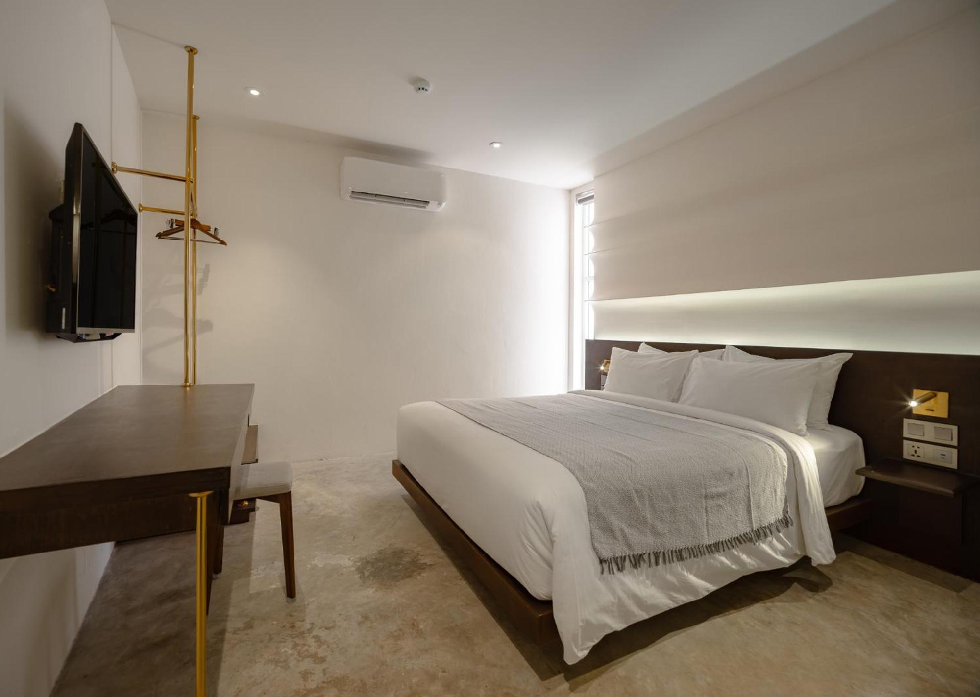 Nidhra Boutique Hotel Bangkok Sukhumvit Banguecoque Quarto foto