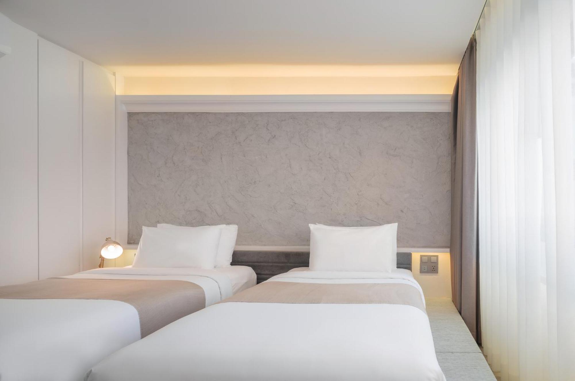 Nidhra Boutique Hotel Bangkok Sukhumvit Banguecoque Quarto foto