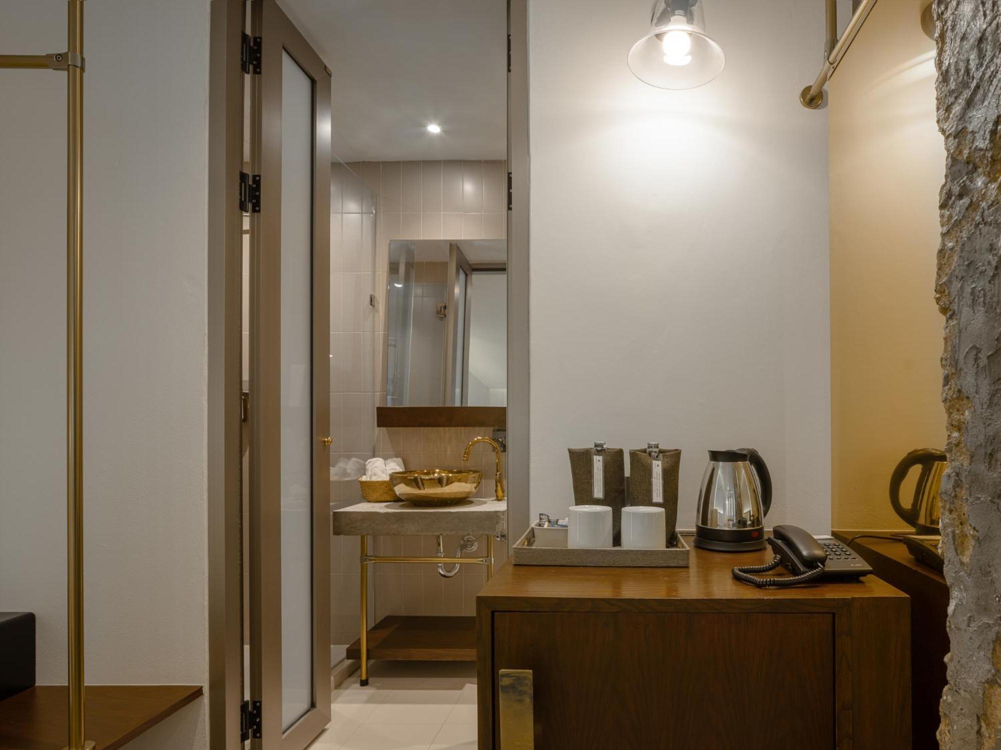 Nidhra Boutique Hotel Bangkok Sukhumvit Banguecoque Quarto foto