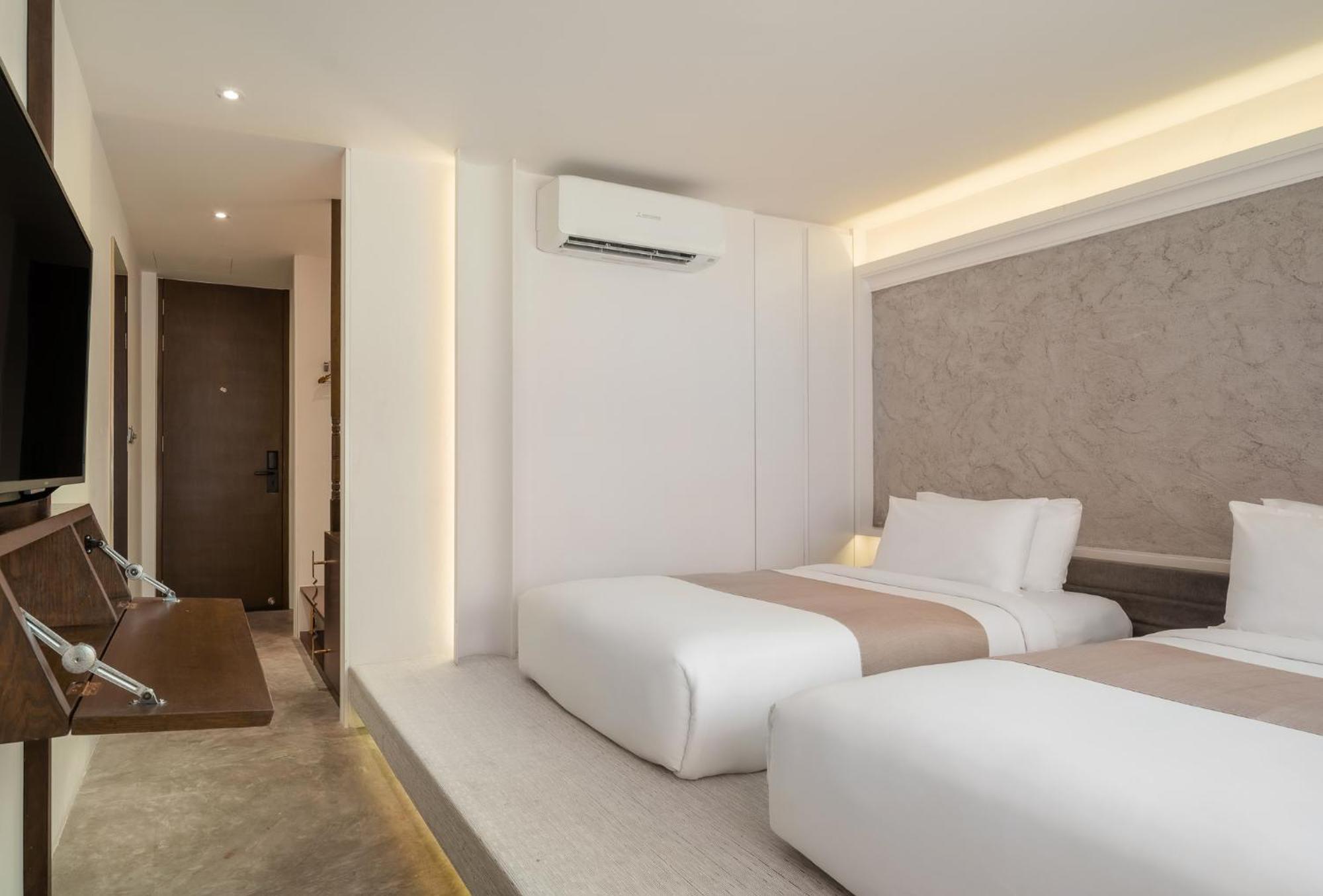 Nidhra Boutique Hotel Bangkok Sukhumvit Banguecoque Quarto foto