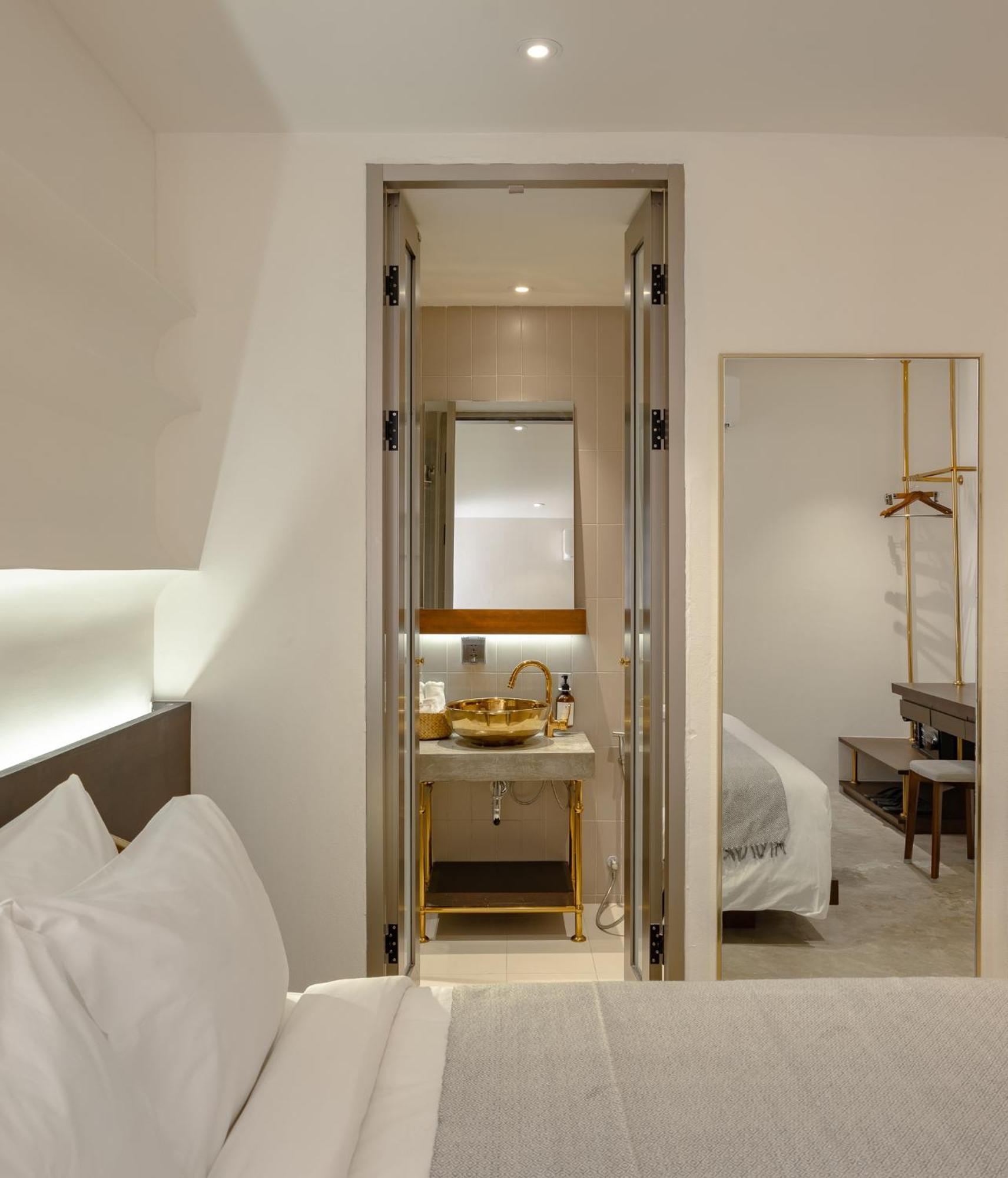 Nidhra Boutique Hotel Bangkok Sukhumvit Banguecoque Quarto foto