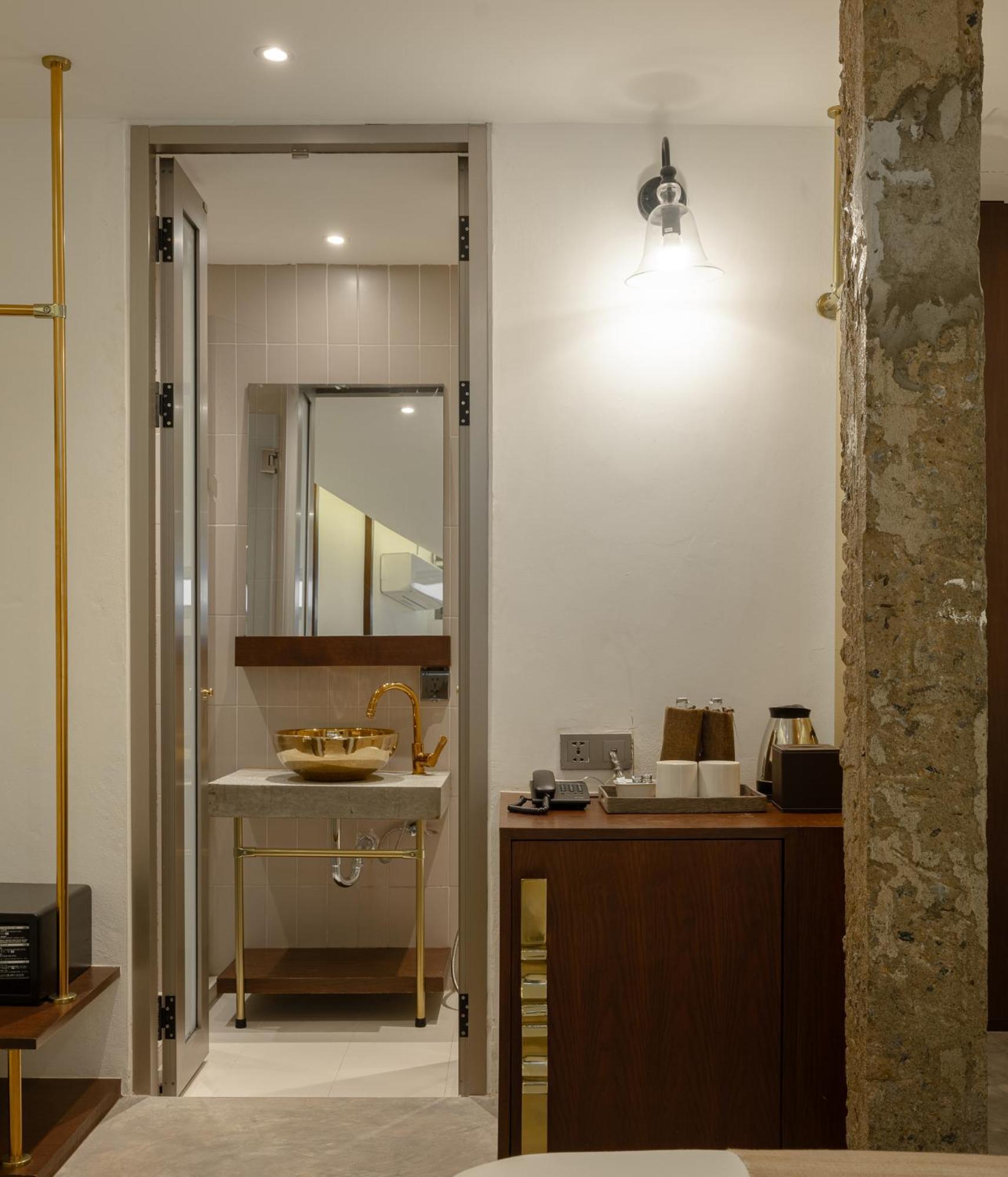 Nidhra Boutique Hotel Bangkok Sukhumvit Banguecoque Quarto foto